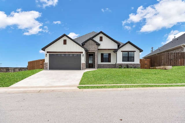122 Buffalo Ridge Rd, Giddings, TX 78942 - modern inspired farmhouse featuring concrete driveway, an attached garage, board and batten siding, and brick siding