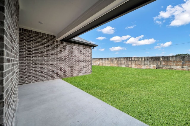 122 Buffalo Ridge Rd, Giddings, TX 78942 - fenced backyard with a patio