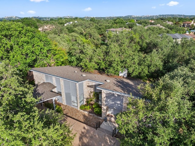 605 Flamingo Blvd, Lakeway, TX 78734 - aerial view of property and surrounding area with a forest