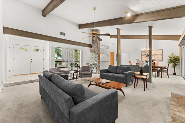 605 Flamingo Blvd, Lakeway, TX 78734 - living area featuring light carpet, beamed ceiling, ceiling fan, and a chandelier