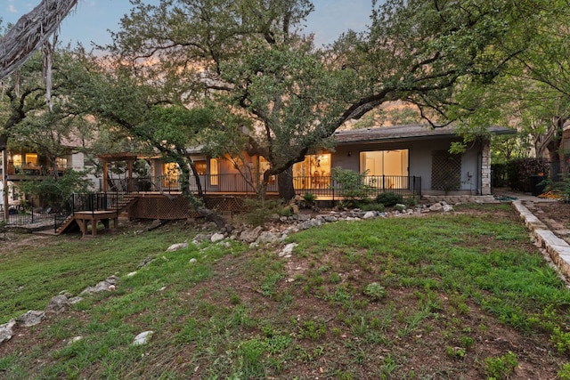 605 Flamingo Blvd, Lakeway, TX 78734 - rear view of property featuring stairway, a lawn, and a wooden deck