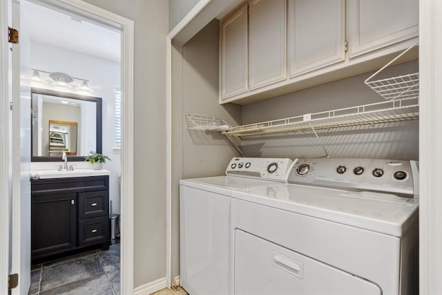 2207 Shoalmont Dr, Austin, TX 78756 - washroom with washing machine and dryer and cabinet space