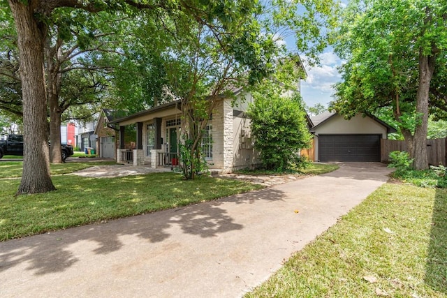 2207 Shoalmont Dr, Austin, TX 78756 - view of front of property featuring a detached garage and stone siding