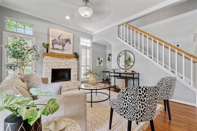 2207 Shoalmont Dr, Austin, TX 78756 - living room with wood finished floors, ornamental molding, plenty of natural light, stairway, and recessed lighting
