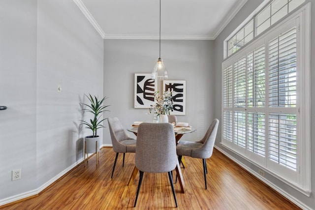 2207 Shoalmont Dr, Austin, TX 78756 - dining space with crown molding and wood finished floors