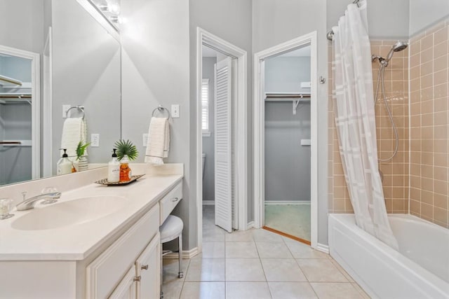 2207 Shoalmont Dr, Austin, TX 78756 - full bath with vanity, shower / bath combo, a spacious closet, and tile patterned flooring