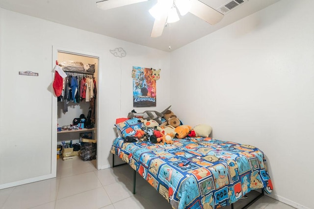 1106 Saucedo St, Austin, TX 78721 - bedroom with a ceiling fan and tile patterned flooring