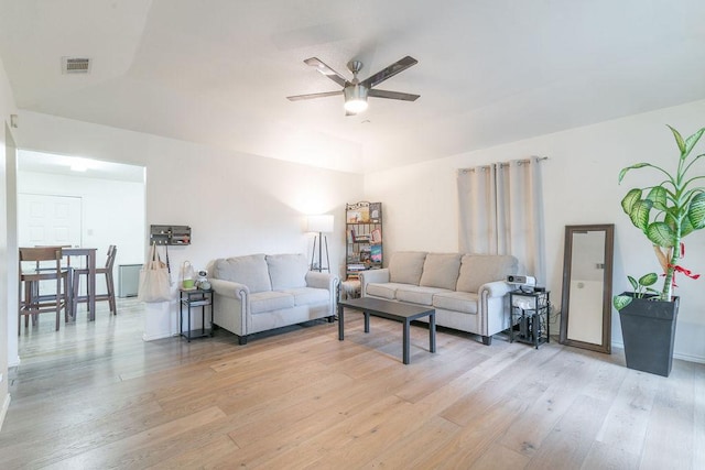 1106 Saucedo St, Austin, TX 78721 - living area featuring a ceiling fan and light wood-style flooring