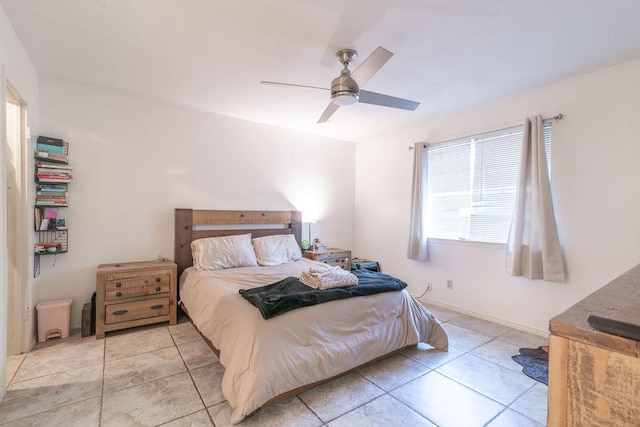 1106 Saucedo St, Austin, TX 78721 - bedroom featuring light tile patterned flooring and ceiling fan