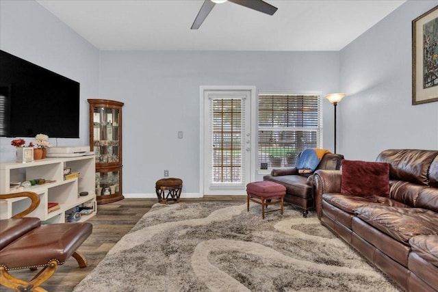 2320 Gracy Farms Ln Unit 918, Austin, TX 78758 - living room with wood finished floors and a ceiling fan