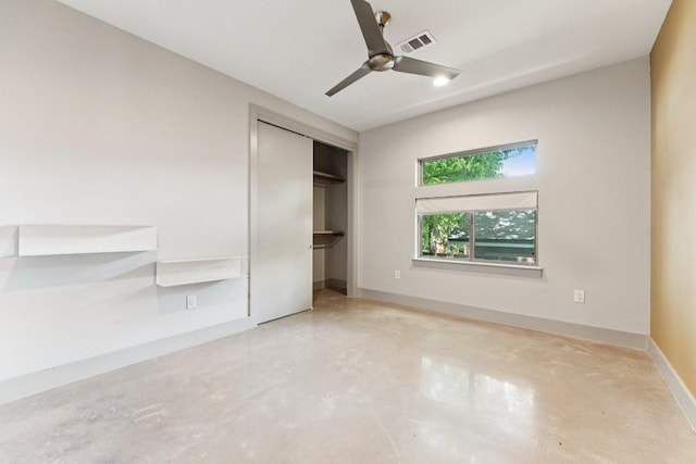 2004 Pennsylvania Ave Unit A, Austin, TX 78702 - unfurnished bedroom with finished concrete flooring, a closet, and a ceiling fan