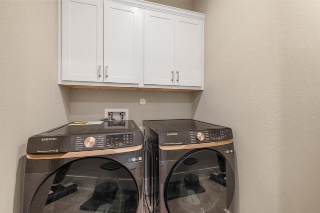 1332 Brescia Walk, Leander, TX 78641 - laundry area featuring independent washer and dryer and cabinet space