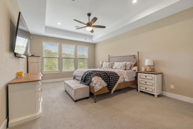 1332 Brescia Walk, Leander, TX 78641 - bedroom with a raised ceiling, light colored carpet, recessed lighting, and a ceiling fan
