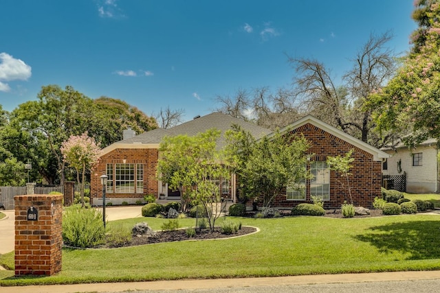 604 Cutty Trl, Lakeway, TX 78734 - view of front of property with brick siding and a chimney