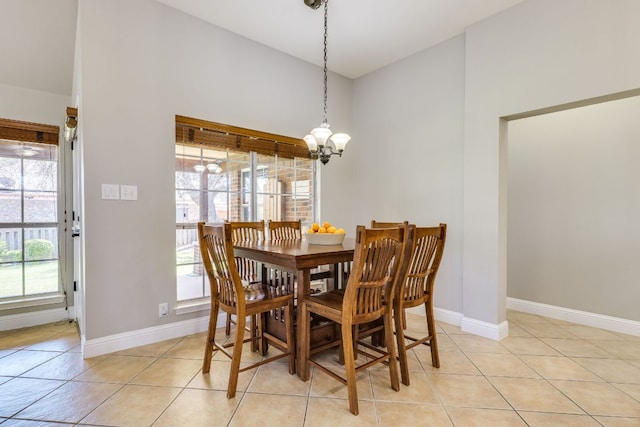604 Cutty Trl, Lakeway, TX 78734 - dining room featuring a chandelier and light tile patterned floors
