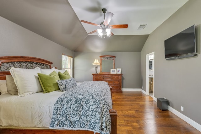 604 Cutty Trl, Lakeway, TX 78734 - bedroom featuring dark wood-style flooring, lofted ceiling, and a ceiling fan