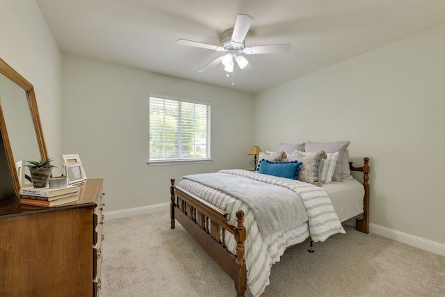 604 Cutty Trl, Lakeway, TX 78734 - bedroom with light carpet and ceiling fan