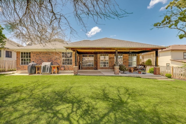 604 Cutty Trl, Lakeway, TX 78734 - back of property with a patio and brick siding