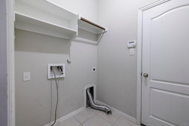 21016 Abigail Way, Pflugerville, TX 78660 - laundry room featuring hookup for an electric dryer, light tile patterned floors, hookup for a washing machine, and hookup for a gas dryer
