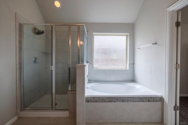 21016 Abigail Way, Pflugerville, TX 78660 - bathroom with a stall shower, a garden tub, tile patterned floors, and vaulted ceiling