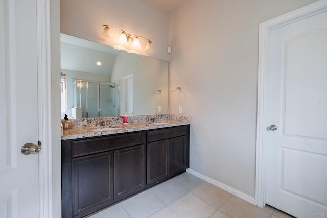 21016 Abigail Way, Pflugerville, TX 78660 - bathroom featuring double vanity, tile patterned floors, and a shower stall