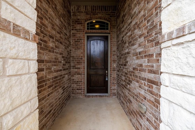 21016 Abigail Way, Pflugerville, TX 78660 - doorway to property featuring brick siding