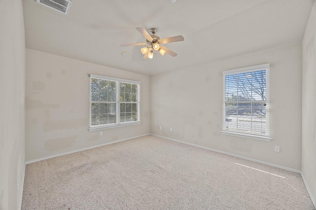 1310 Parmer Ln W Unit 3201, Austin, TX 78727 - carpeted spare room with baseboards and a ceiling fan
