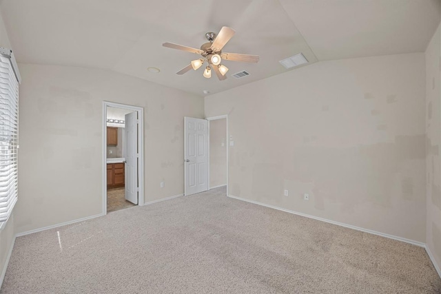 1310 Parmer Ln W Unit 3201, Austin, TX 78727 - unfurnished bedroom with lofted ceiling, light colored carpet, ensuite bath, and ceiling fan