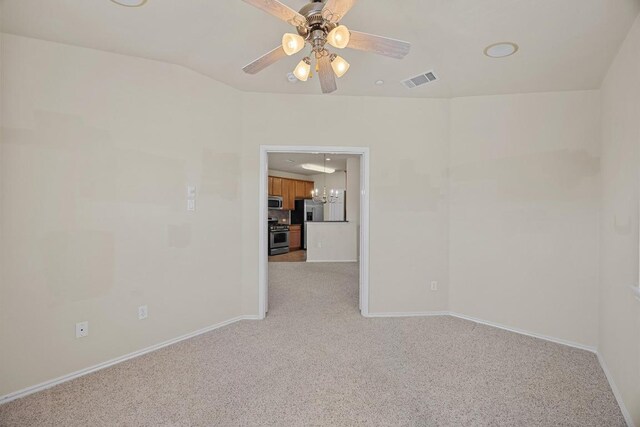 1310 Parmer Ln W Unit 3201, Austin, TX 78727 - empty room featuring light carpet, ceiling fan, and a chandelier