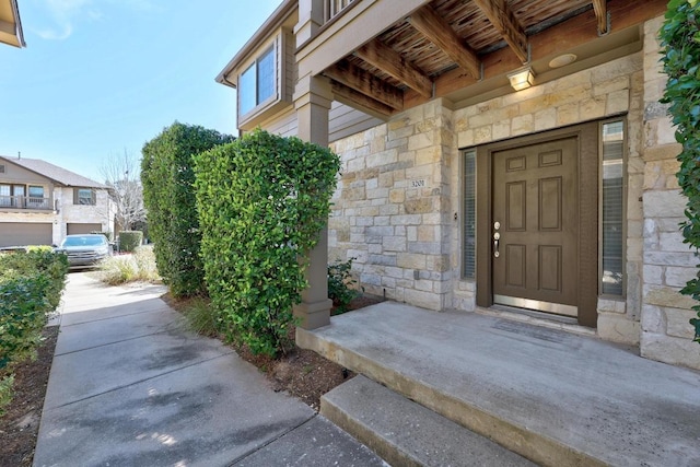1310 Parmer Ln W Unit 3201, Austin, TX 78727 - property entrance featuring stone siding