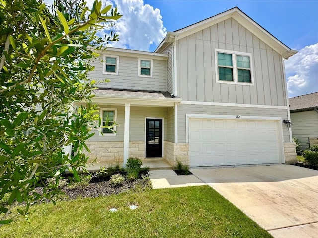 149 Gullivers Dr, Elgin, TX 78621 - craftsman house with an attached garage, board and batten siding, driveway, and stone siding
