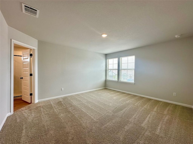 149 Gullivers Dr, Elgin, TX 78621 - spare room with light colored carpet and baseboards