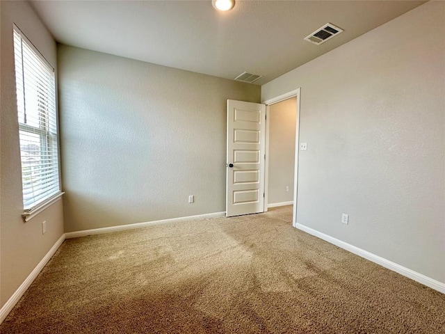149 Gullivers Dr, Elgin, TX 78621 - empty room with carpet flooring and baseboards