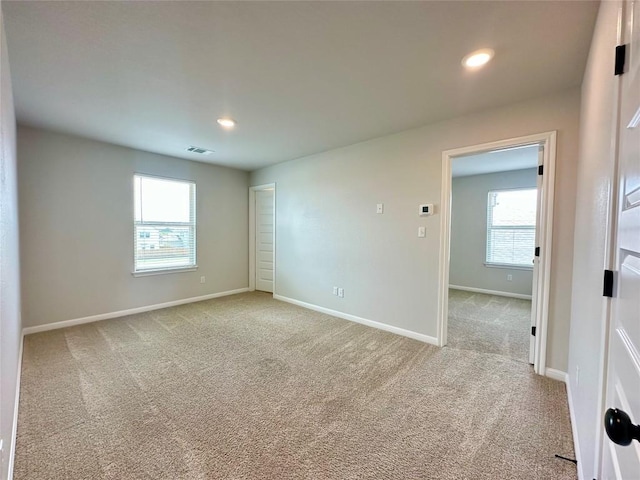 149 Gullivers Dr, Elgin, TX 78621 - empty room with light carpet and recessed lighting