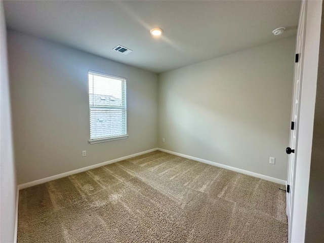 149 Gullivers Dr, Elgin, TX 78621 - carpeted spare room with baseboards and a smoke detector