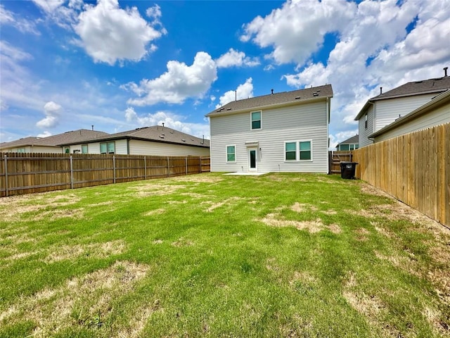 149 Gullivers Dr, Elgin, TX 78621 - back of house with a fenced backyard