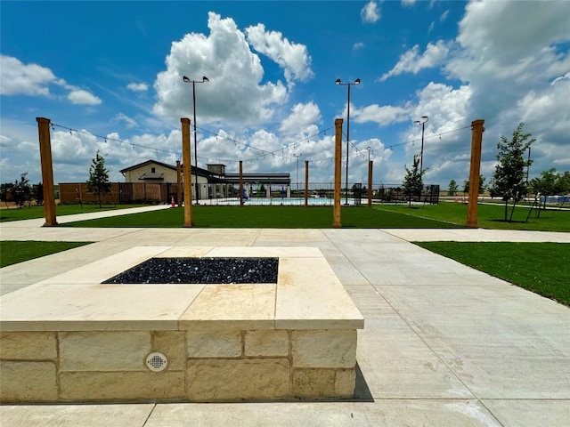 149 Gullivers Dr, Elgin, TX 78621 - view of home's community featuring a fire pit