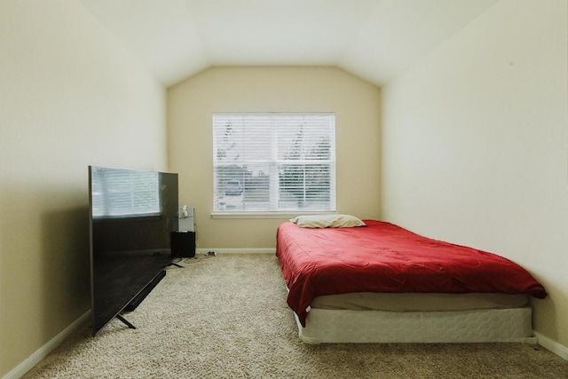 184 Voss St, Kyle, TX 78640 - carpeted bedroom featuring baseboards and vaulted ceiling