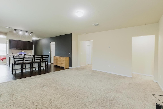 184 Voss St, Kyle, TX 78640 - empty room featuring track lighting and carpet