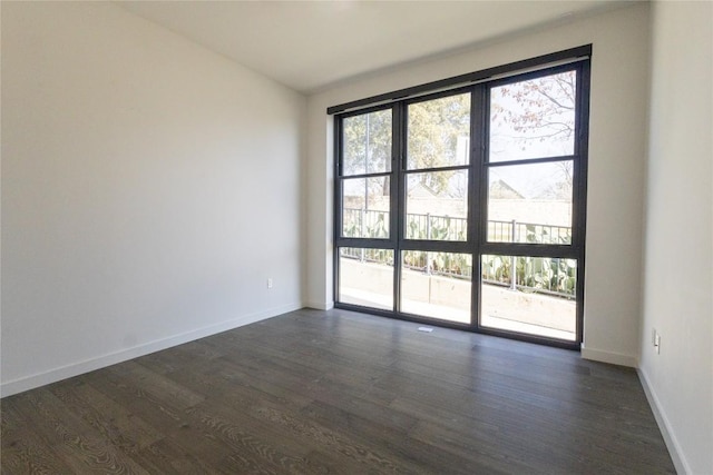 800 Embassy Dr Unit 137, Austin, TX 78702 - unfurnished room with dark wood finished floors