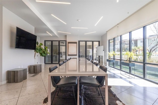 800 Embassy Dr Unit 137, Austin, TX 78702 - dining space with french doors and light tile patterned flooring
