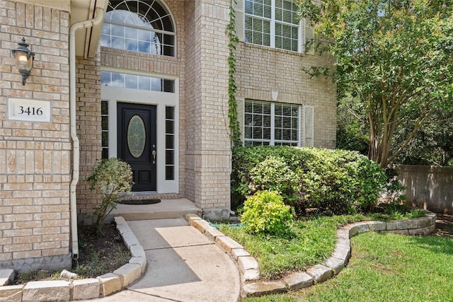 3416 Oxsheer Dr, Austin, TX 78732 - view of exterior entry featuring brick siding