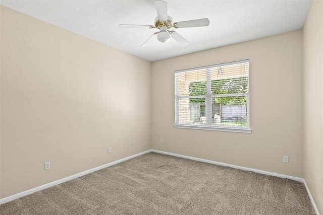 3416 Oxsheer Dr, Austin, TX 78732 - carpeted spare room with baseboards and a ceiling fan