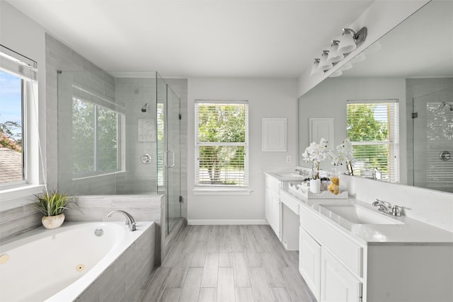 3416 Oxsheer Dr, Austin, TX 78732 - bathroom with a jetted tub, a stall shower, and double vanity