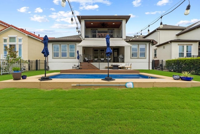 1329 Siena Sunset Rd, Leander, TX 78641 - back of property featuring a balcony, stucco siding, ceiling fan, and a patio