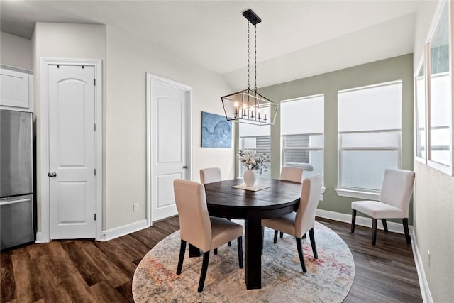 1329 Siena Sunset Rd, Leander, TX 78641 - dining space featuring dark wood-type flooring and a chandelier