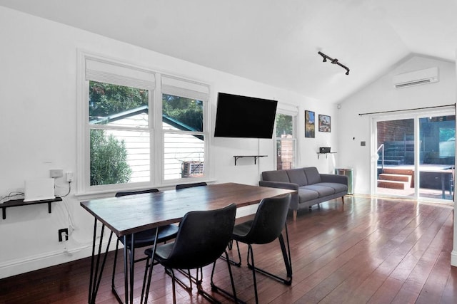 1914 E 8th St, Austin, TX 78702 - dining area with an AC wall unit, lofted ceiling, plenty of natural light, and dark wood-style flooring