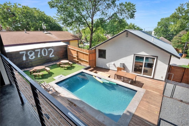 1914 E 8th St, Austin, TX 78702 - view of pool featuring a wooden deck and a fenced backyard
