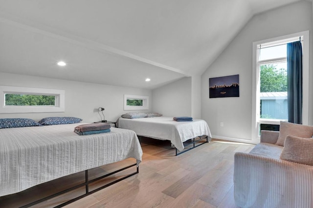 1914 E 8th St, Austin, TX 78702 - bedroom featuring vaulted ceiling, light wood-style floors, and recessed lighting