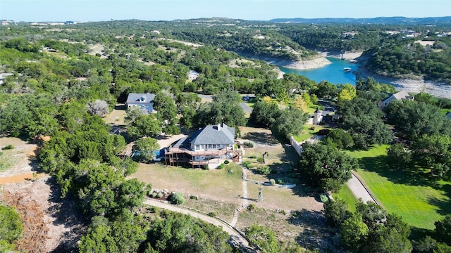 18113 Travis Dr, Lago Vista, TX 78645 - drone / aerial view of a nearby body of water and a heavily wooded area